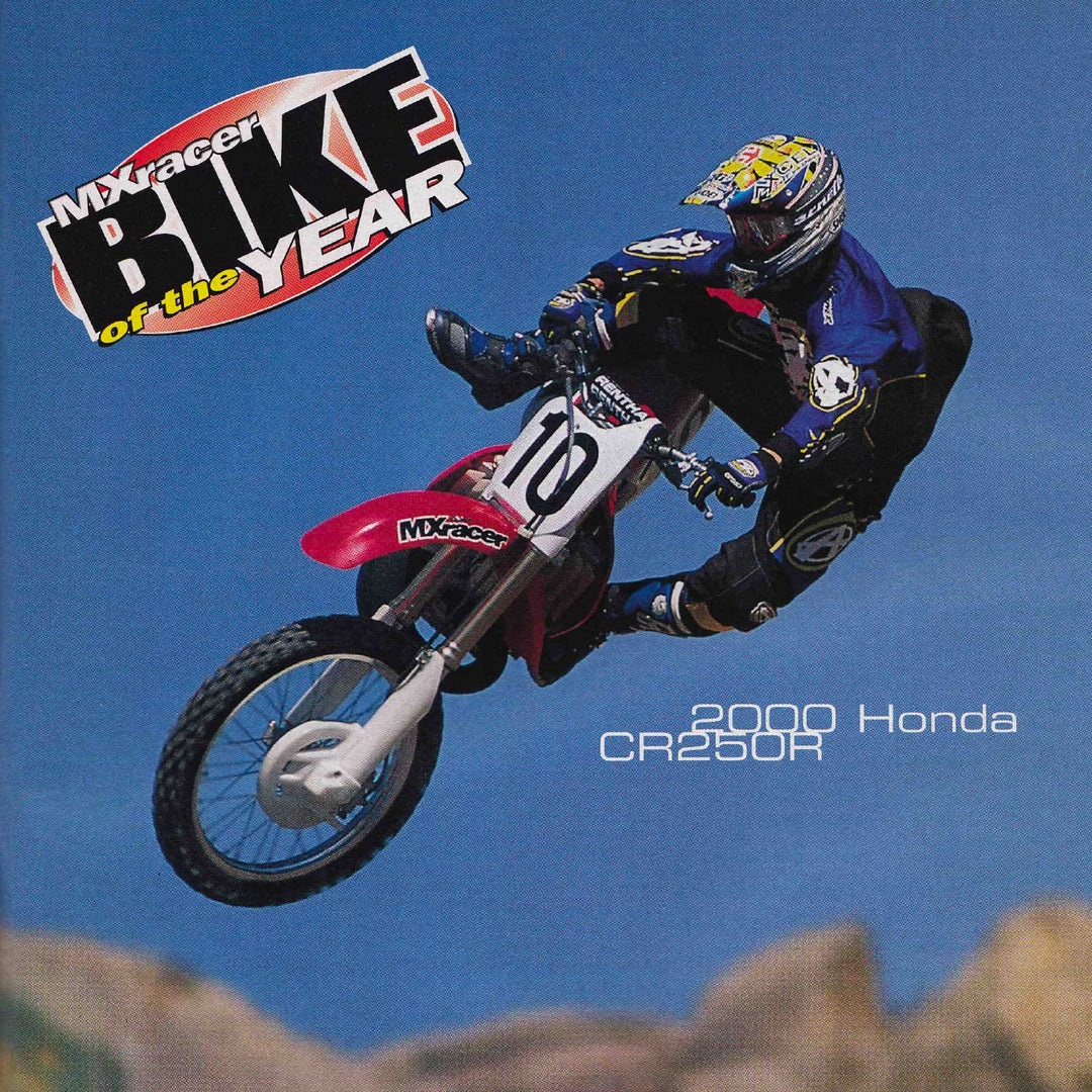 Chris Cooley jumping a Honda CR250R in MX Racer magazine.