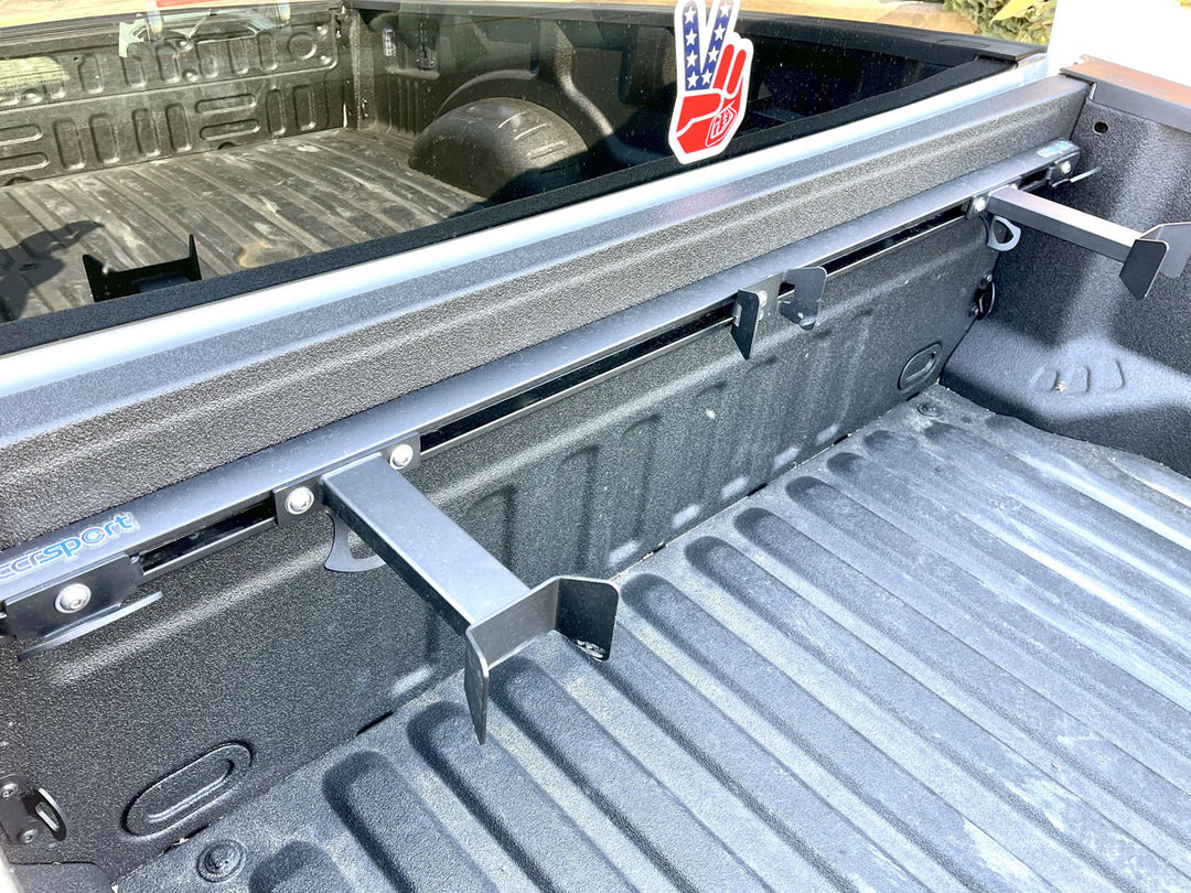 CCR Sport moto rack featured with offset wheel chocks mounted in bed of a truck.