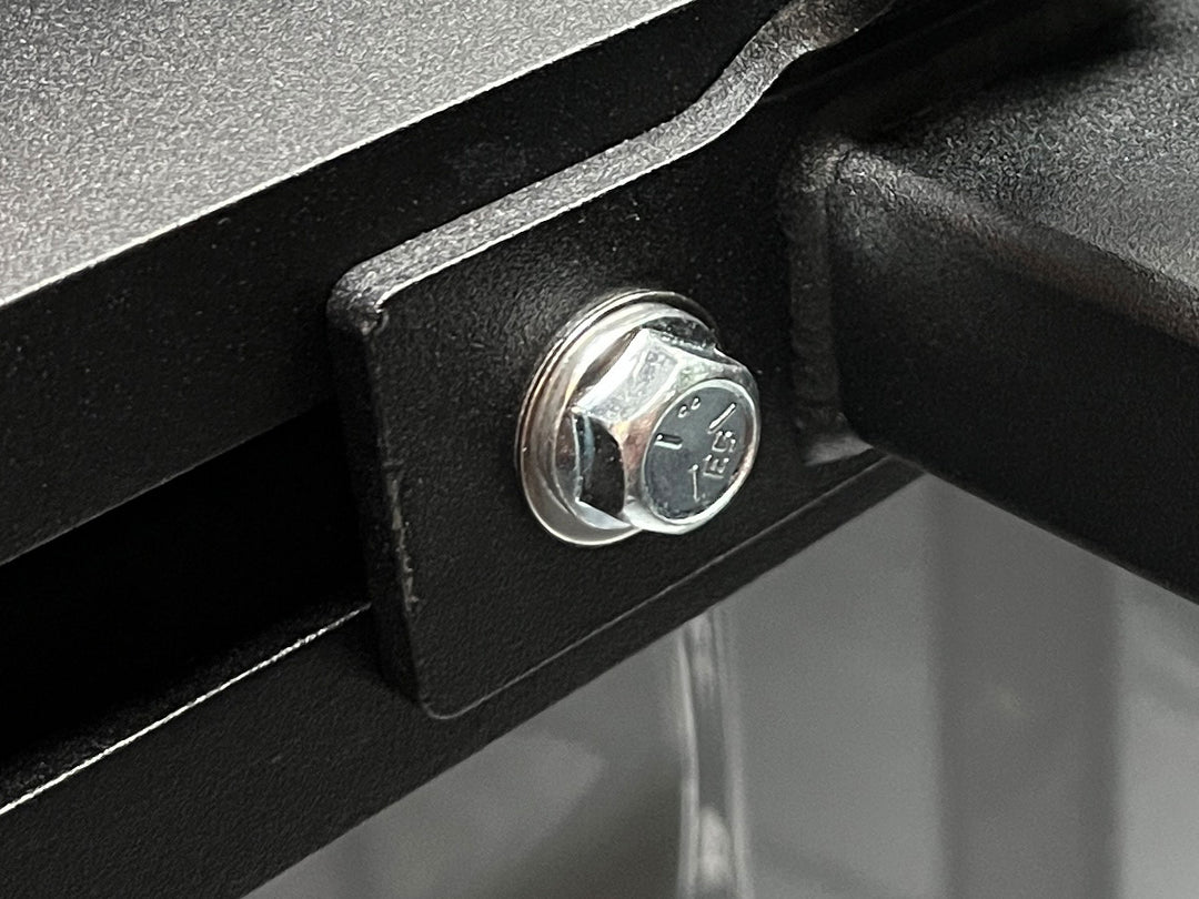 Close-up of fastener hardware of offset wheel chock.