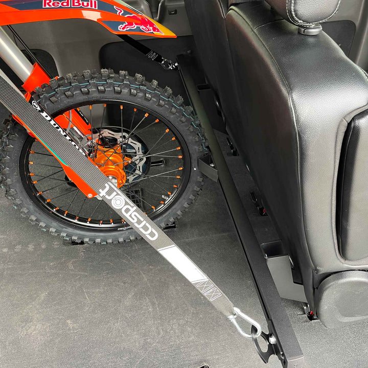 Red Bull KTM tie-dowm to the Hybrid Moto Rack in a Mercedes Sprinter van.