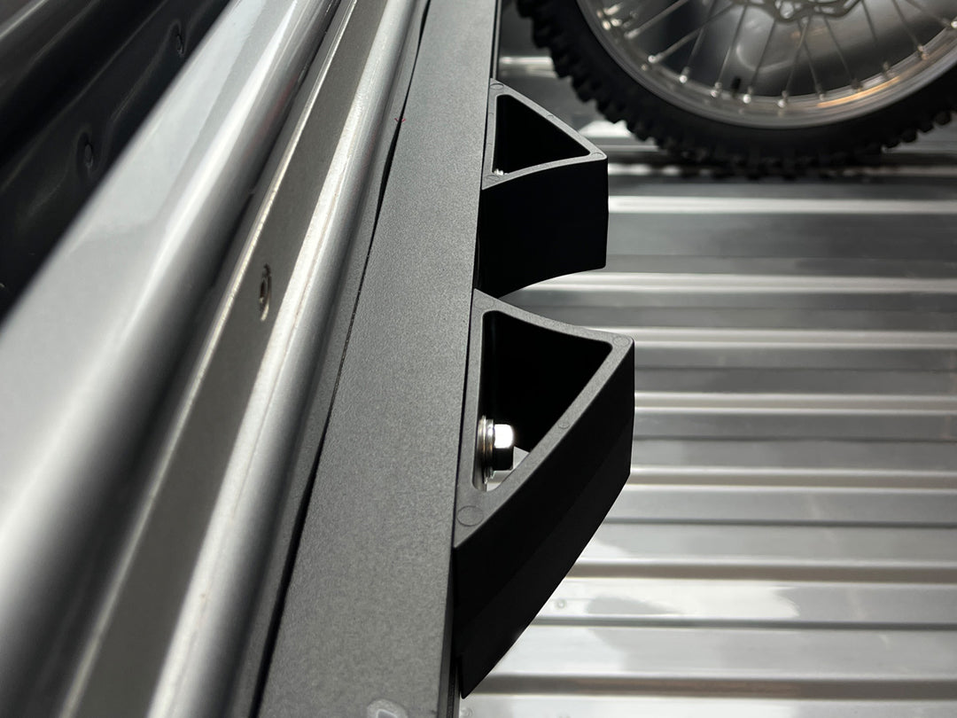 Close-up of a truck bed wheel chock.