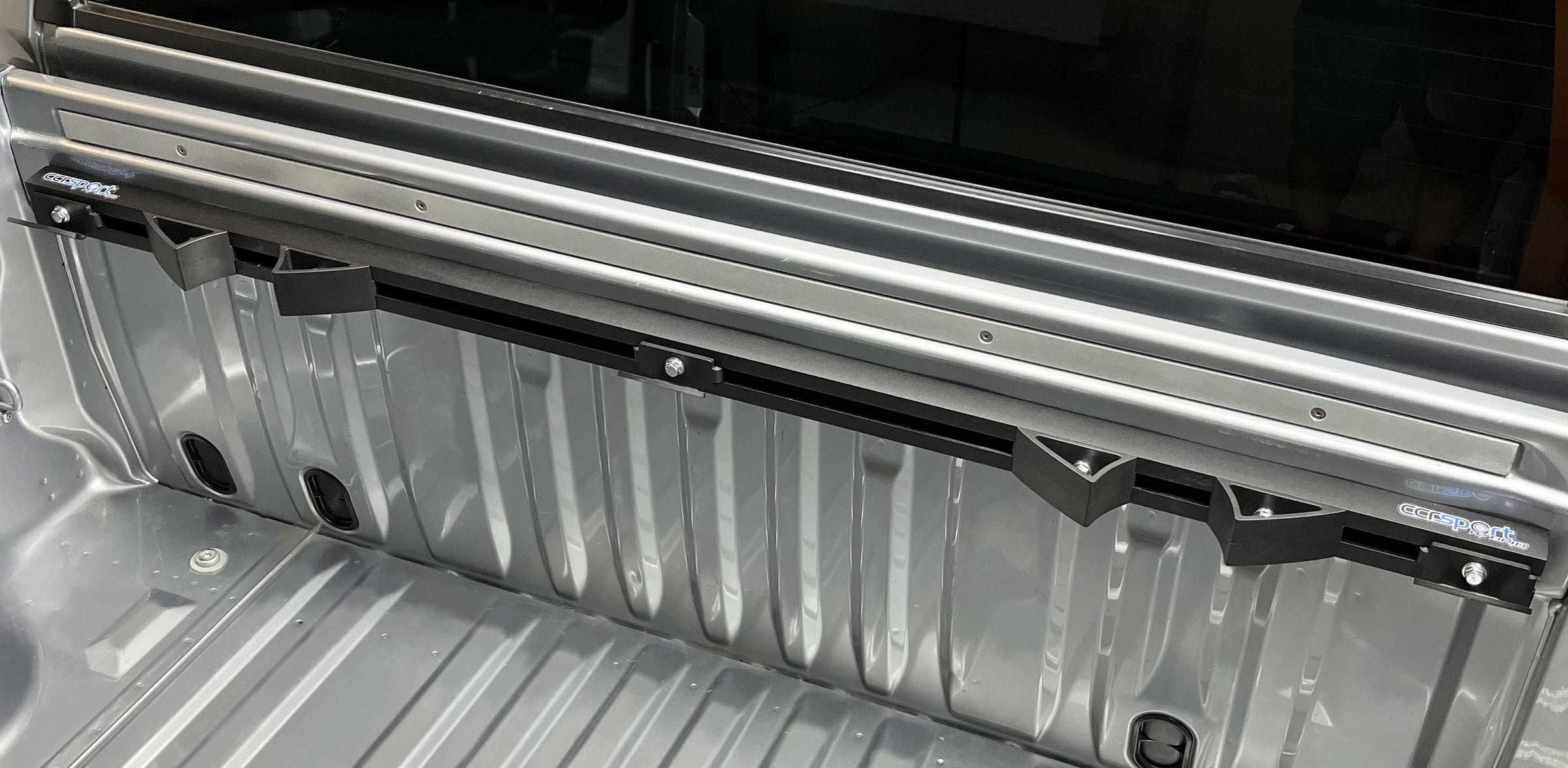 Close-up of truck bed with Hybrid Moto Rack installed.