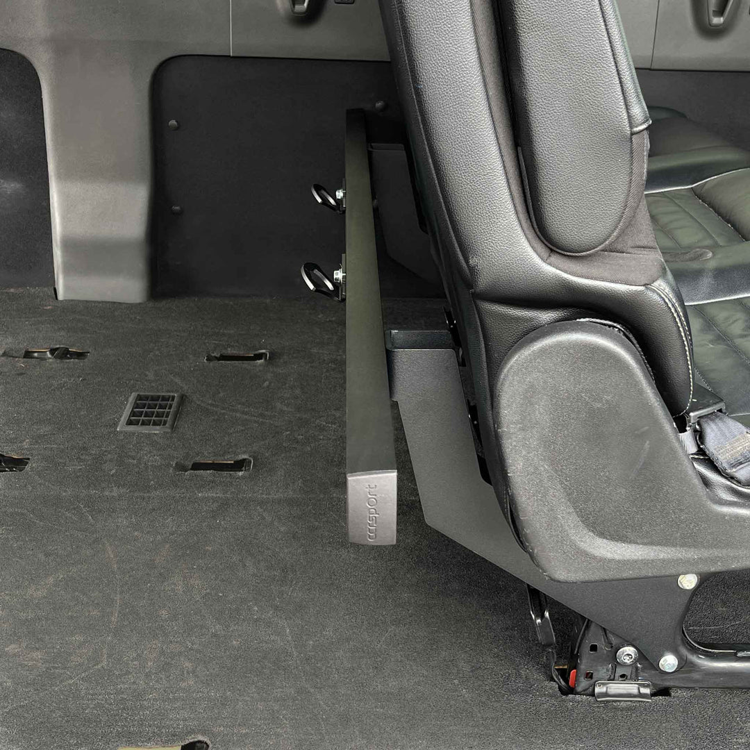 Hybrid van rack shown in basic configuration installed to rear passenger seat.