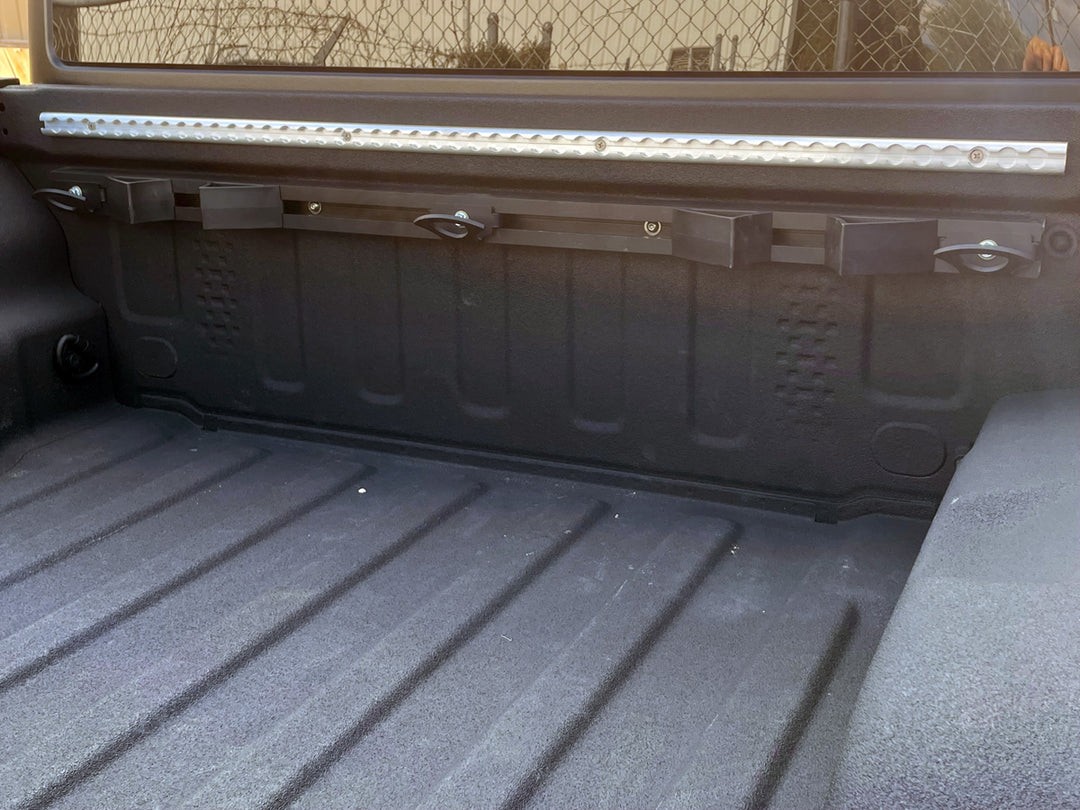 CCR Sport Hybrid motorcycle transport mounting system installed in the bed of a Jeep Gladiator pickup truck.