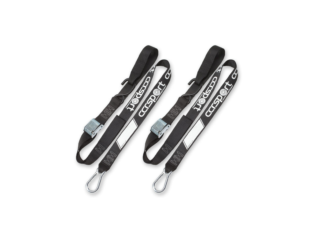 Bright white studio background with a single pair of CCR Sport Pro Moto Tie-Down Straps.