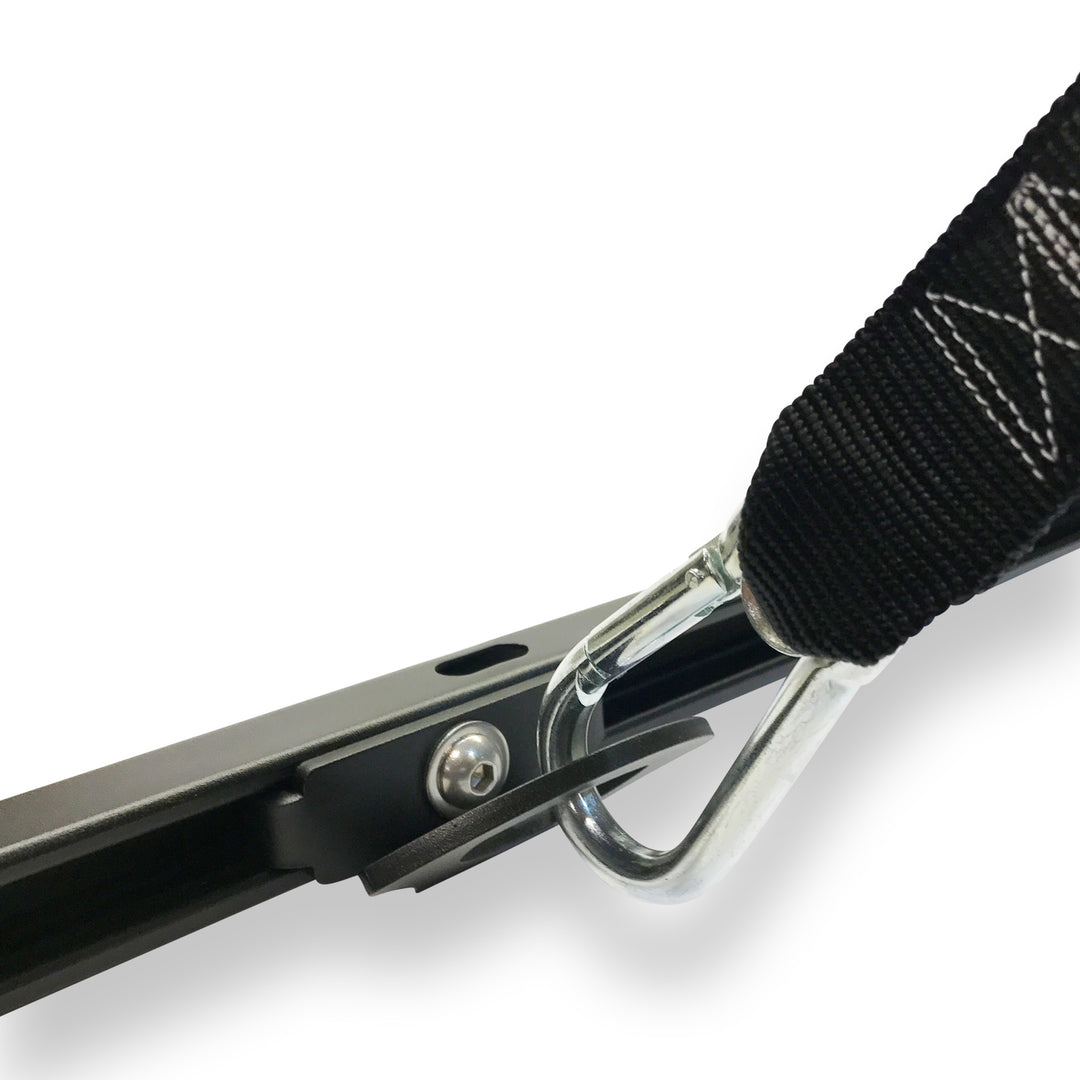 A carabiner tie-down strap shown attached to the CCR Sport Toyota Deck Rail Anchor. 