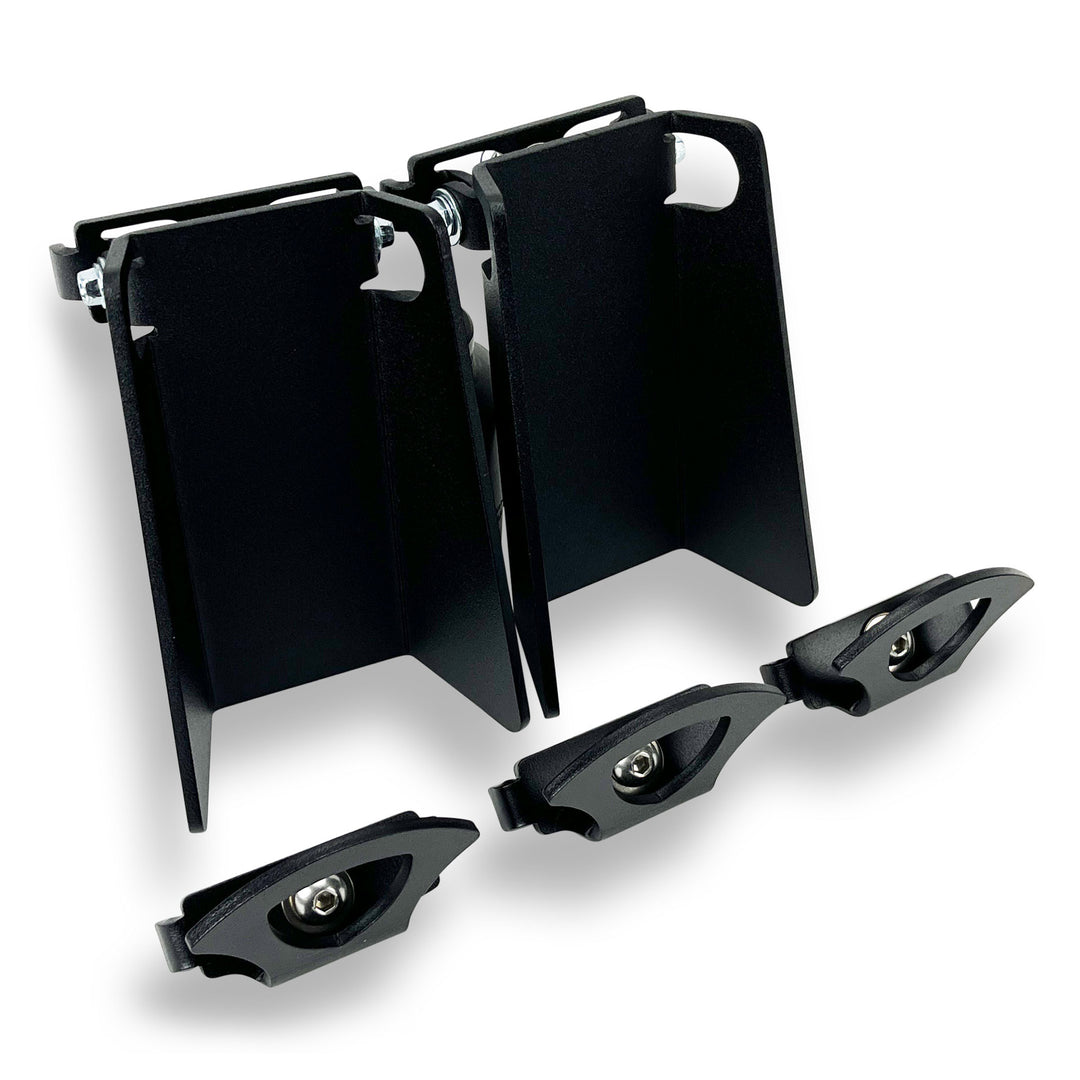 Studio image of two pivot chocks and three tie-down anchors for Toyota Deck Rail