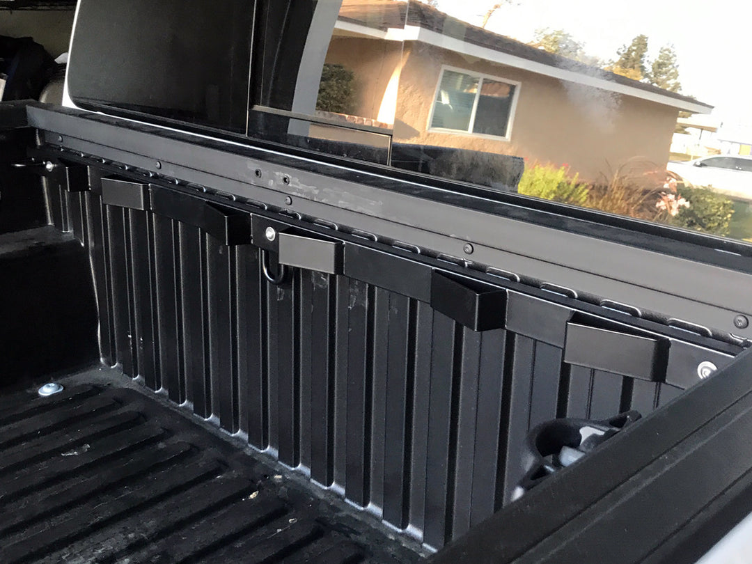 The CCR Sport Bed Buddy motorcycle tie down rack installed to the Toyota composite truck bed.