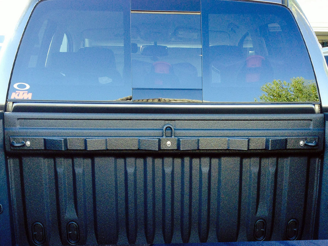The Bed Buddy motorcycle tie-down truck rack installed in the bed of a truck.