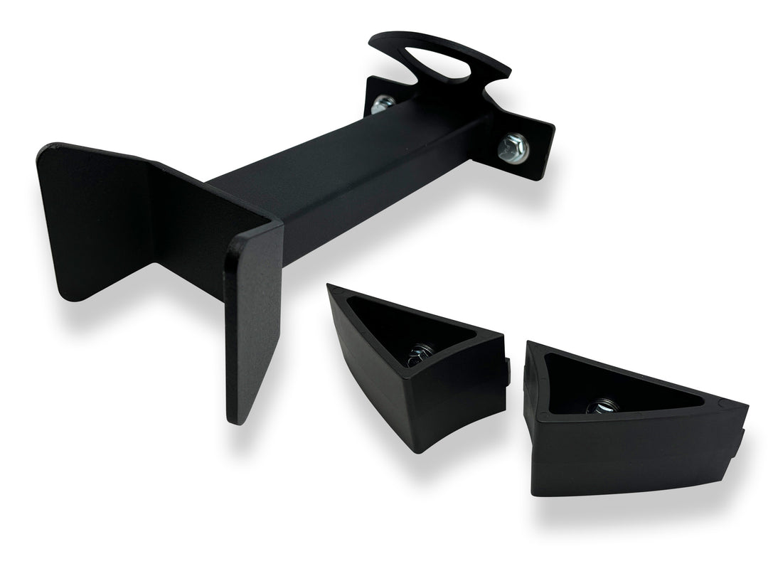 An Offset Wheel Chock and a Moto Vise wheel chock on a white studio background.