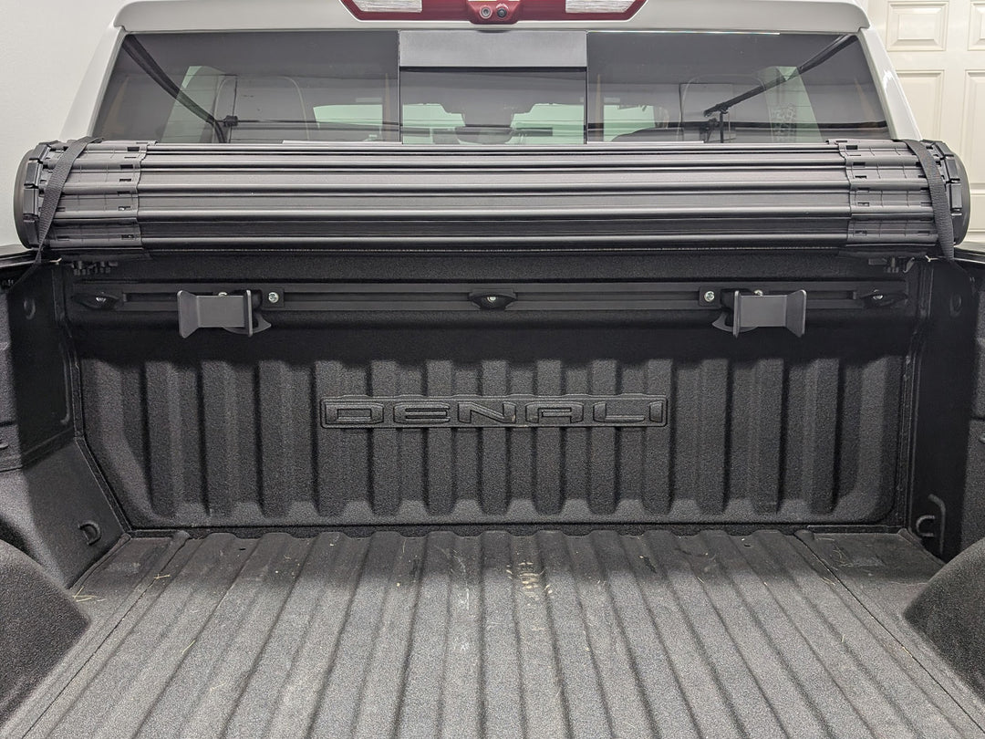 The CCR Sport Hybrid Moto Rack featuring two Offset wheel chocks with a roll-up truck bed cover.